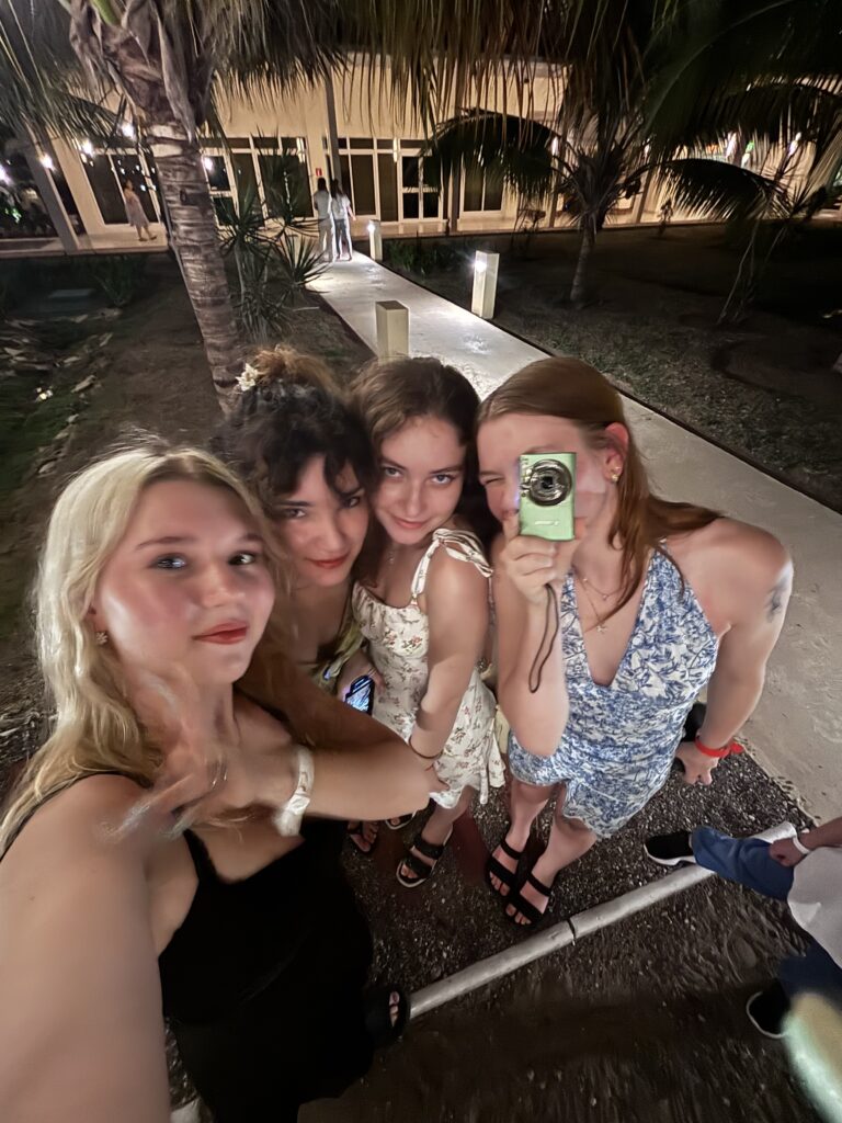four-girls-taking-selfie-together-evening