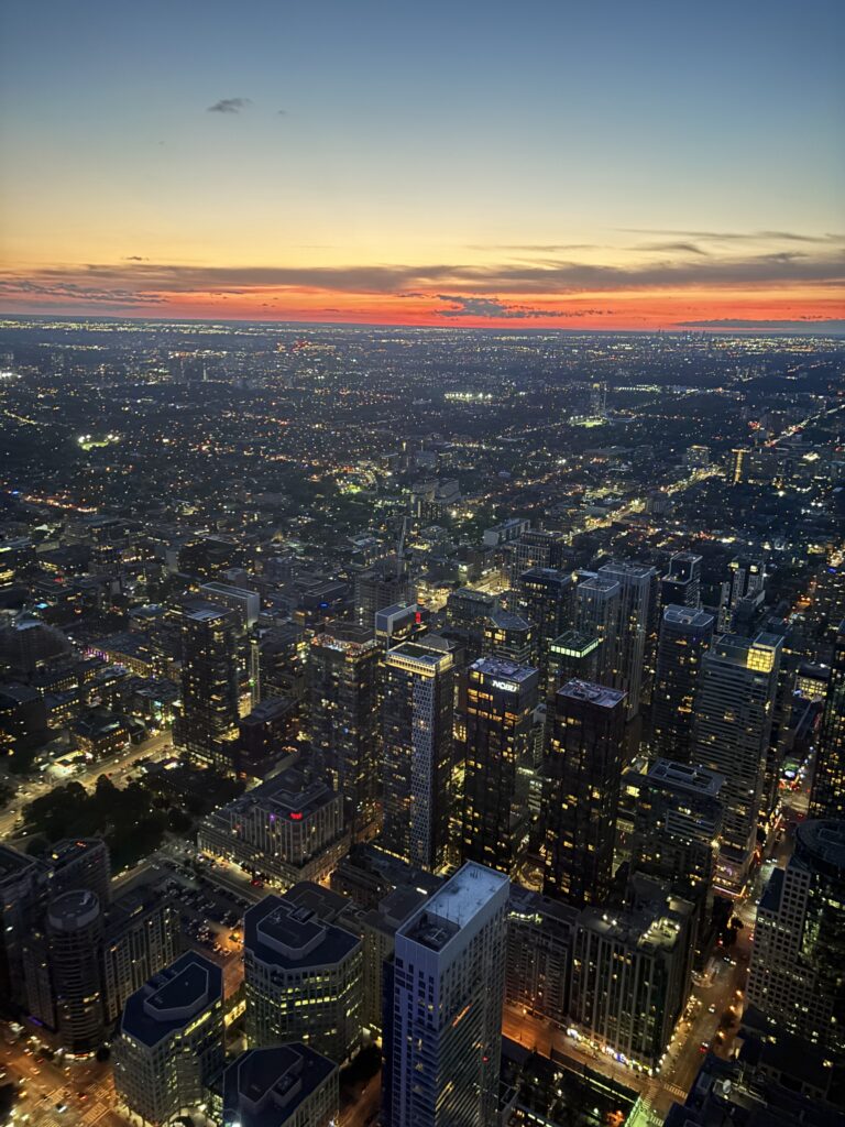 warm-toned-sunset-cn-tower-view-nightscape-city-lights